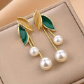 45515 Korean Elegant Tassel Earrings with Pearl and Green Leaf Accents