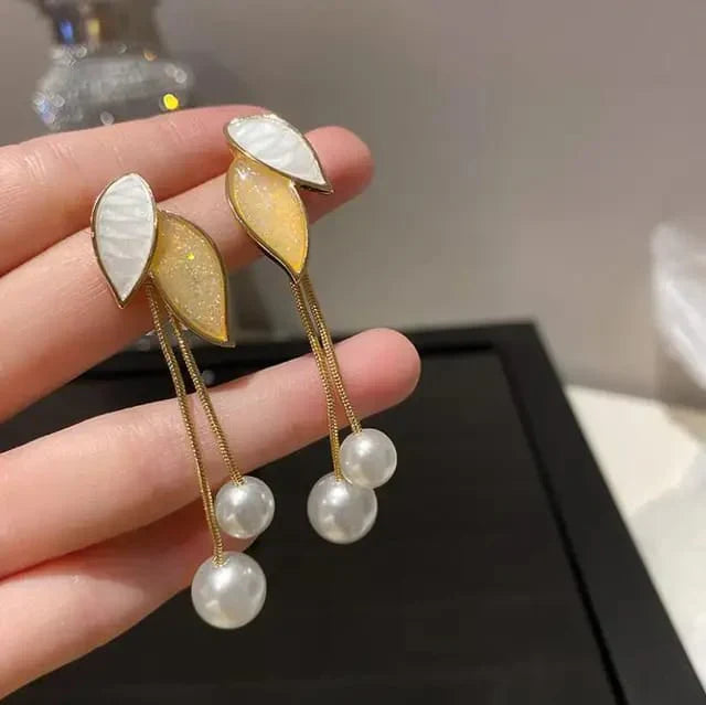 diamond bow pearl earring